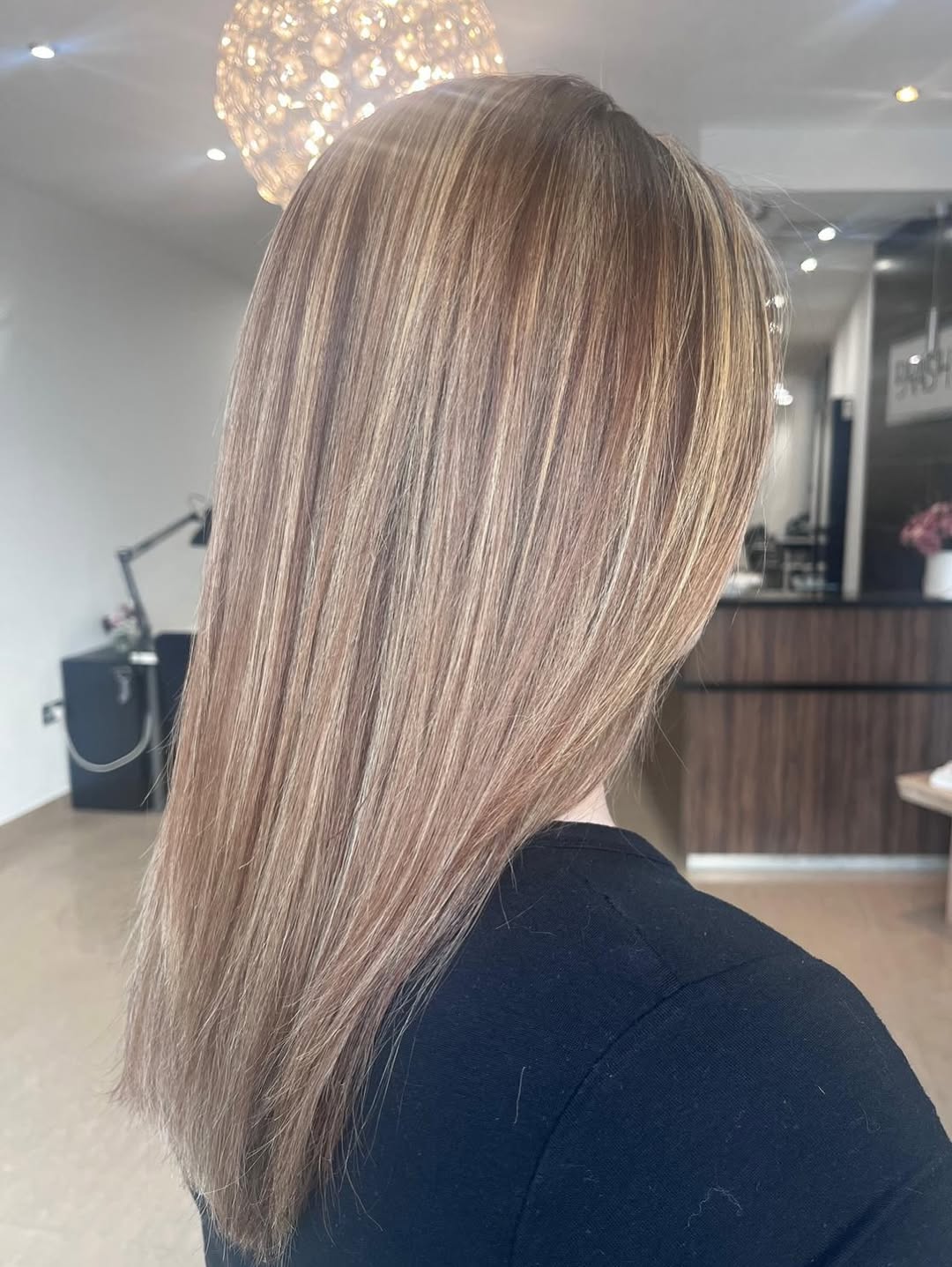 Glossy highlighted brunette hair